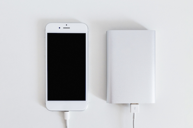 phone with a portable charger, great travel gifts.