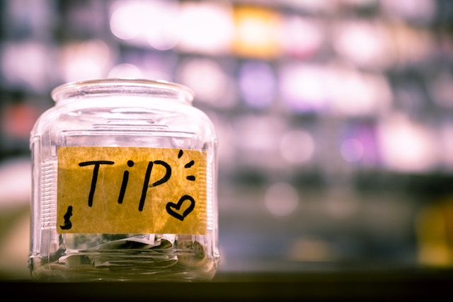 A money tip jar, rude or not to tip?