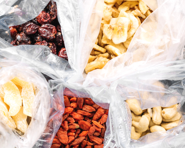 mini plastic bags full of dried snacks.