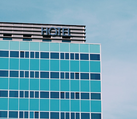 Photo of a blue hotel.