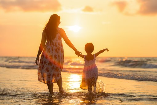 Mother and daughter at the beach